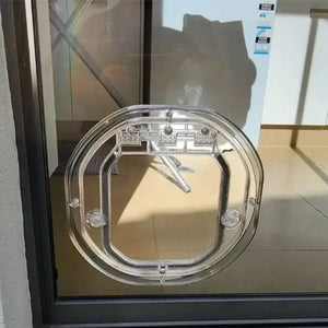 Chatière ronde transparente installée sur vitre coulissante aluminium